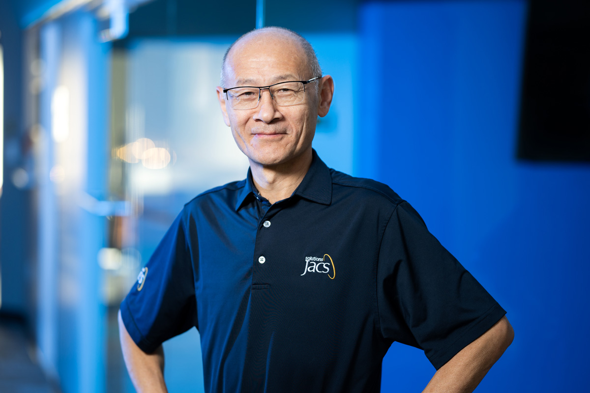 Dr. Chang Gang Zhang poses for the camera at JACS Solutions headquarters